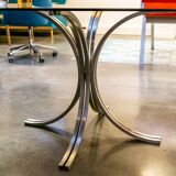 Table ovale en verre fumé et inox