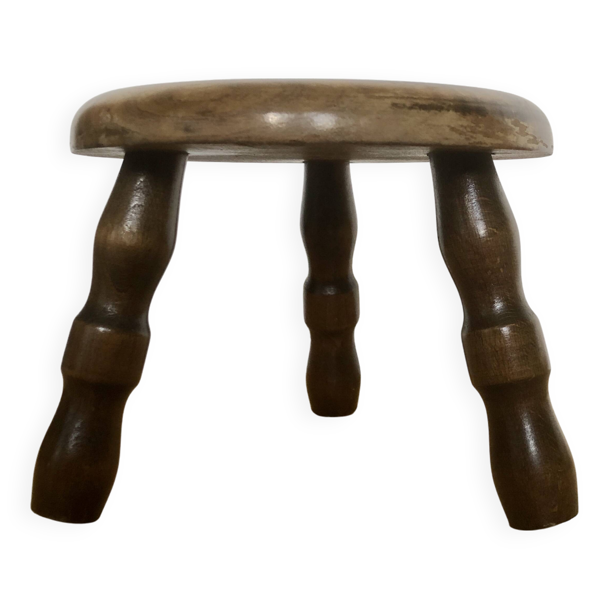 Low tripod stool in solid wood