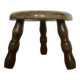 Low tripod stool in solid wood