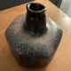 Black ceramic vase and galaxy, signed