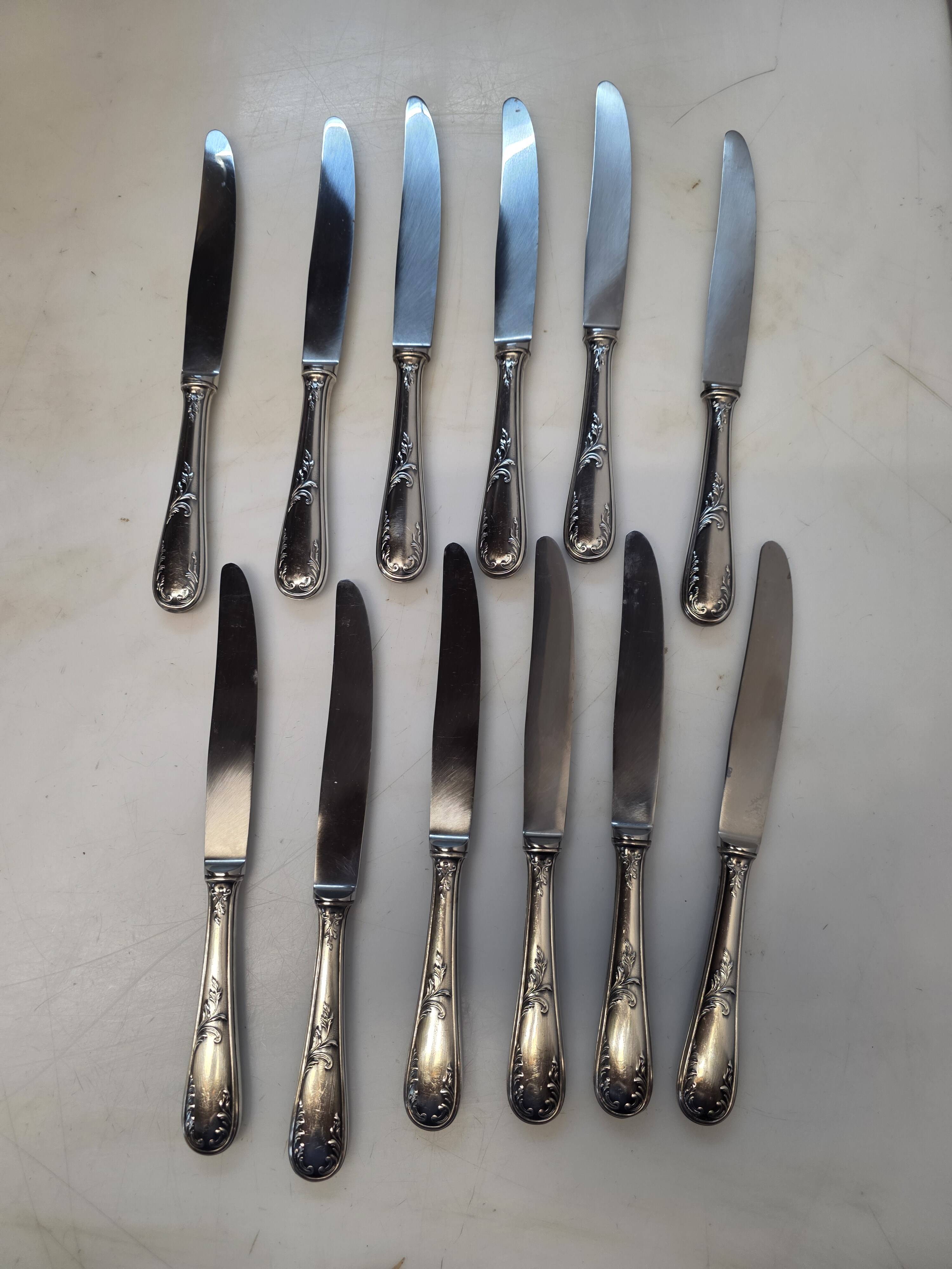 12 silver-plated knives