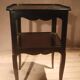 Black bedside table with two shelves, Louis XV style