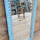 Antique Art Deco mirror in Burmese teak.