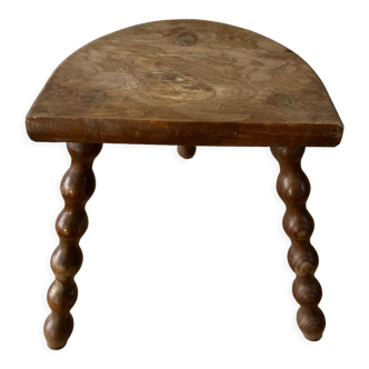 Wooden tripod farm stool