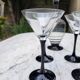 4 verres à cocktail et carafe assortie