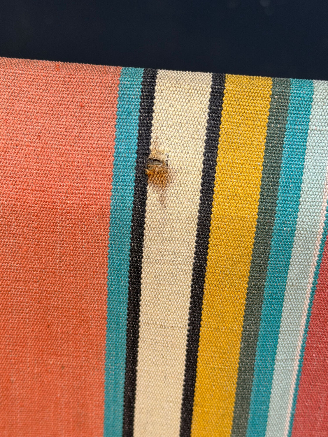 Vintage striped multicoloured deck chair with original patina.