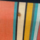 Vintage striped multicoloured deck chair with original patina.