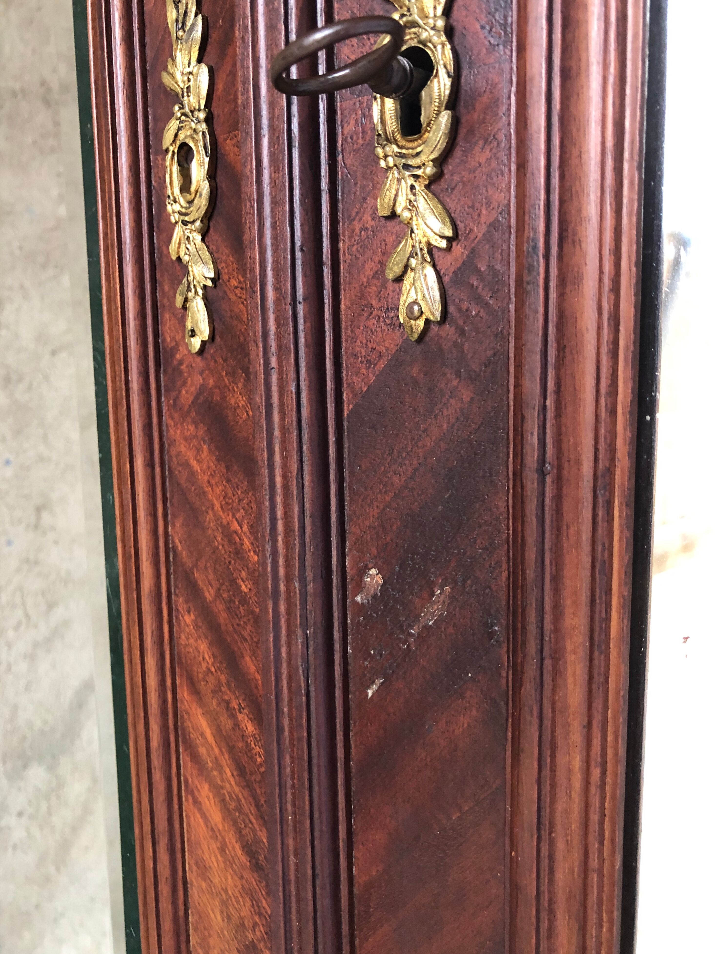 Louis XVI bronze and mahogany cabinet from Mercier Frères