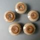 5 glazed stoneware shells, signed