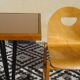 Pair of light wood chairs with post-formed seat and backrest.