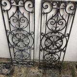 Pair of old cast iron door grilles