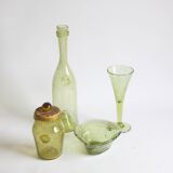 Biot bubble glass ensemble, bottle, jar, bowl and glass.
