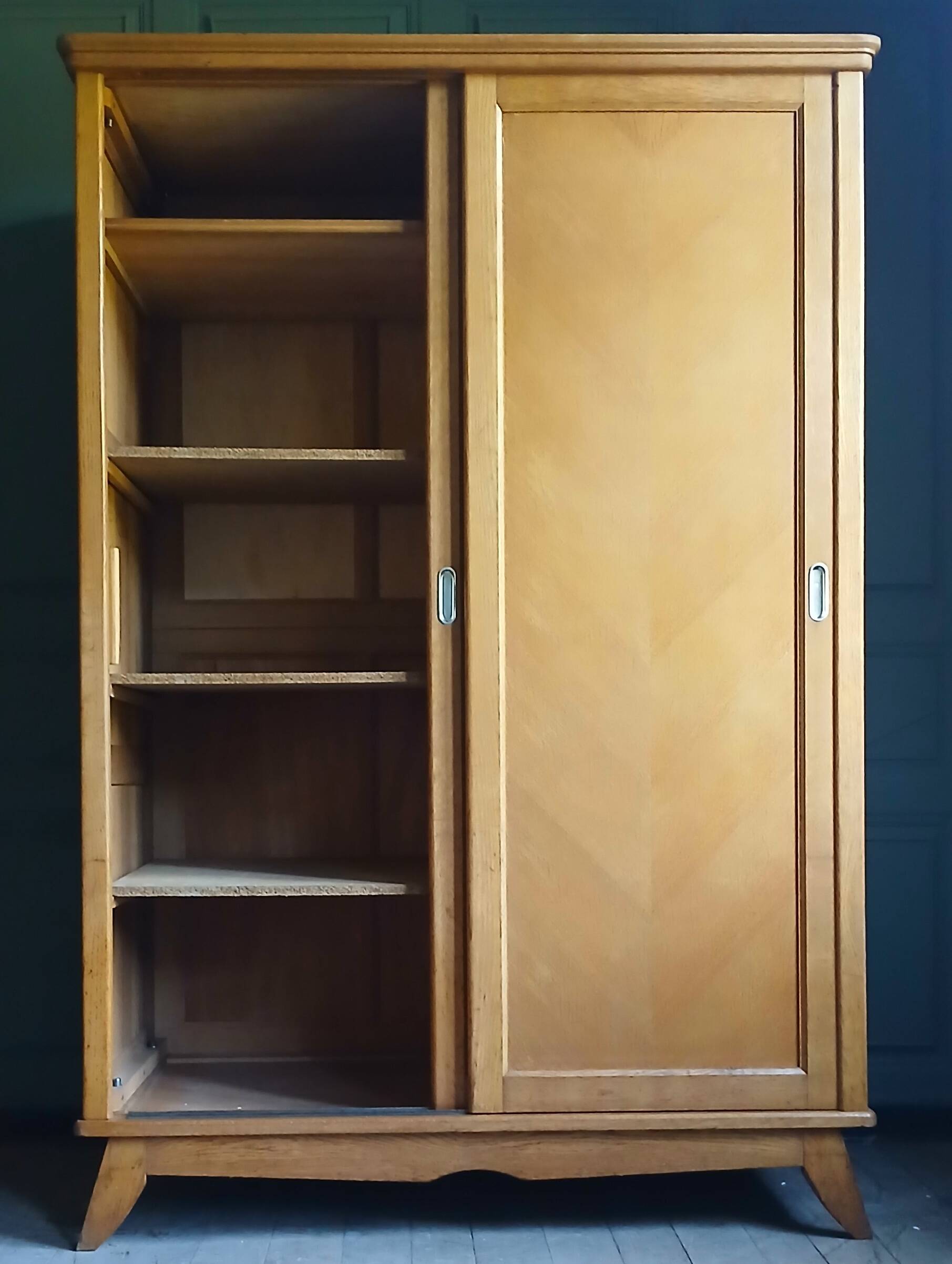Parisian wardrobe with sliding doors. France around 1940.