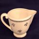 Antique milk jug in Gien earthenware, Valence model A040.
