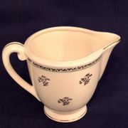 Antique milk jug in Gien earthenware, Valence model A040.