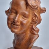 Bust of a laughing child in patinated plaster, 35 cm