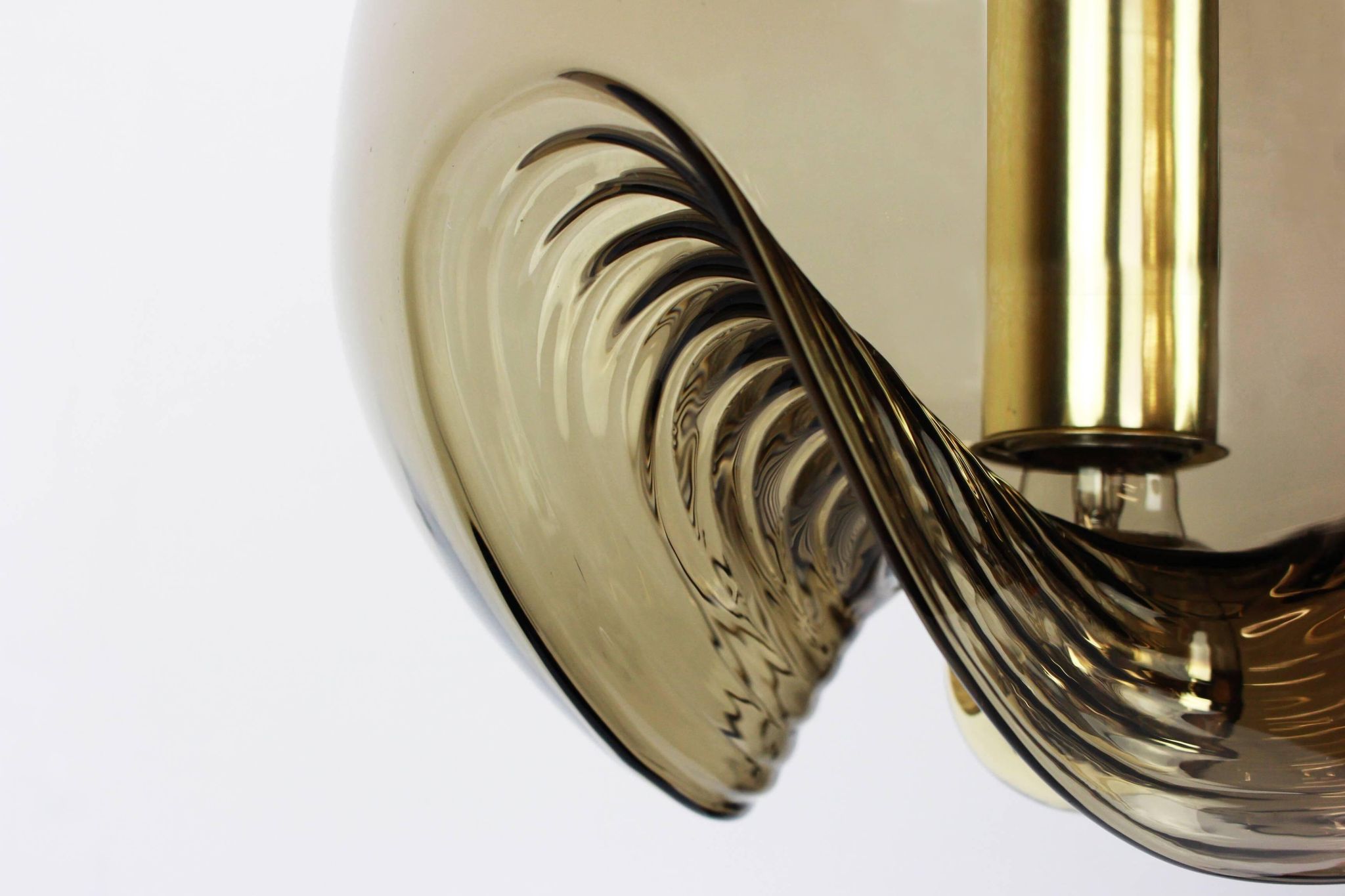 One of the four large smoked glass pendants by Peill & Putzler, Germany, 1970s.