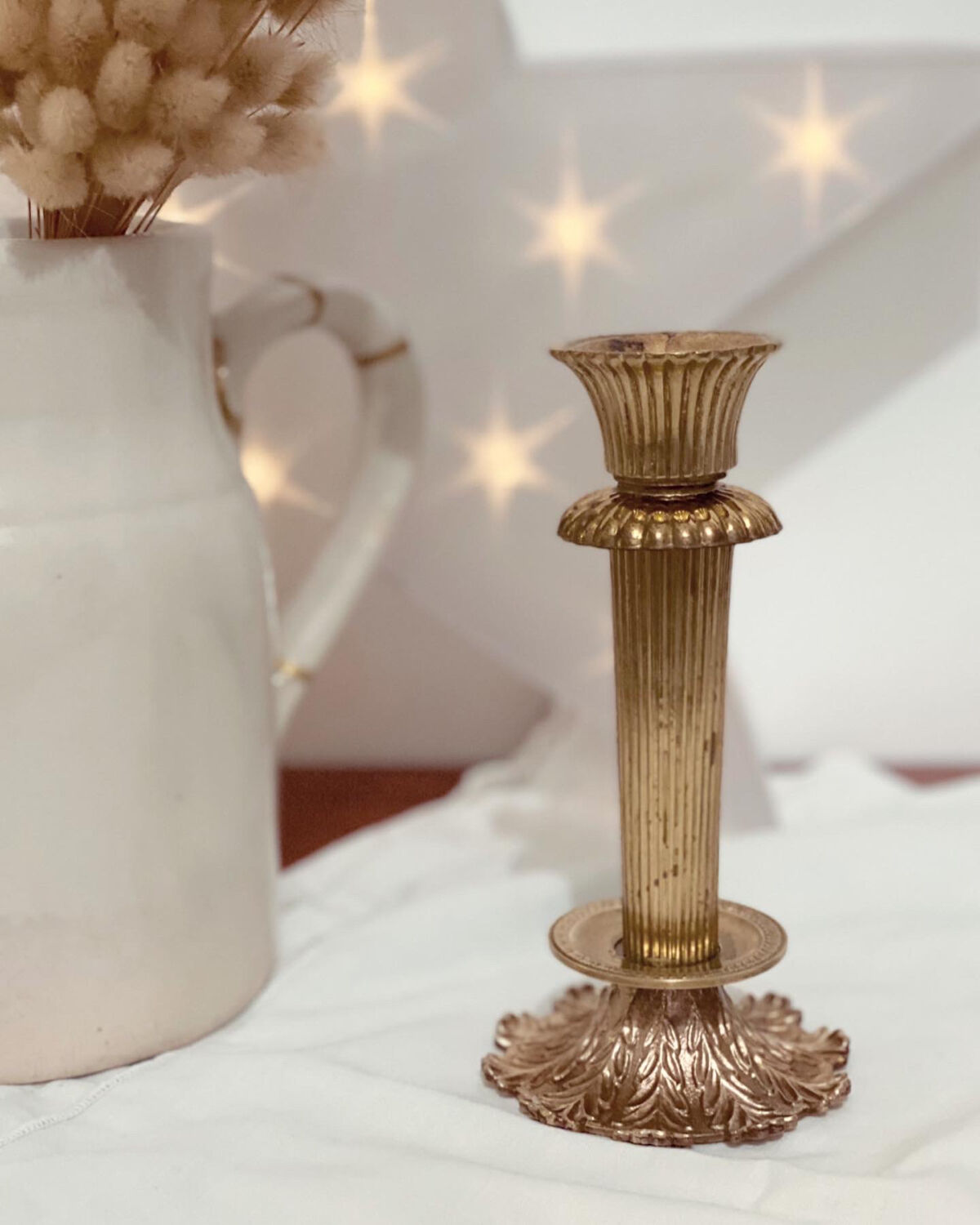 Lots of brass candle holders