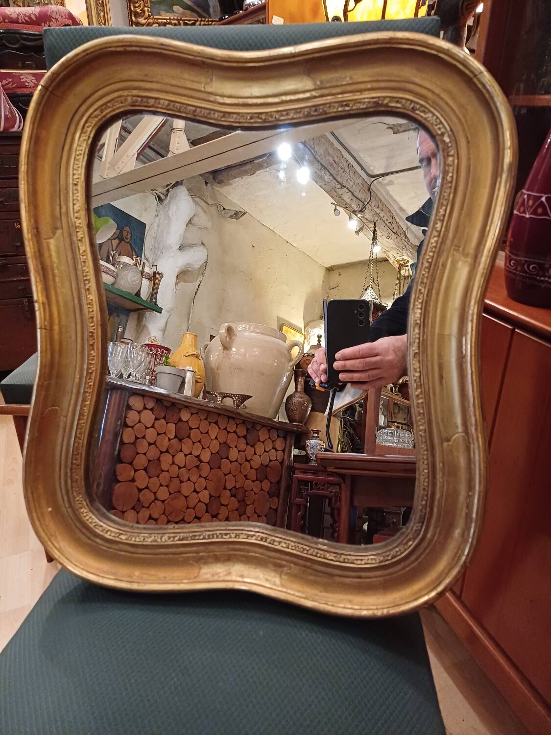 Antique golden quadrilobe-shaped mirror