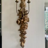 Carved wall lamp in wood of the seventeenth century