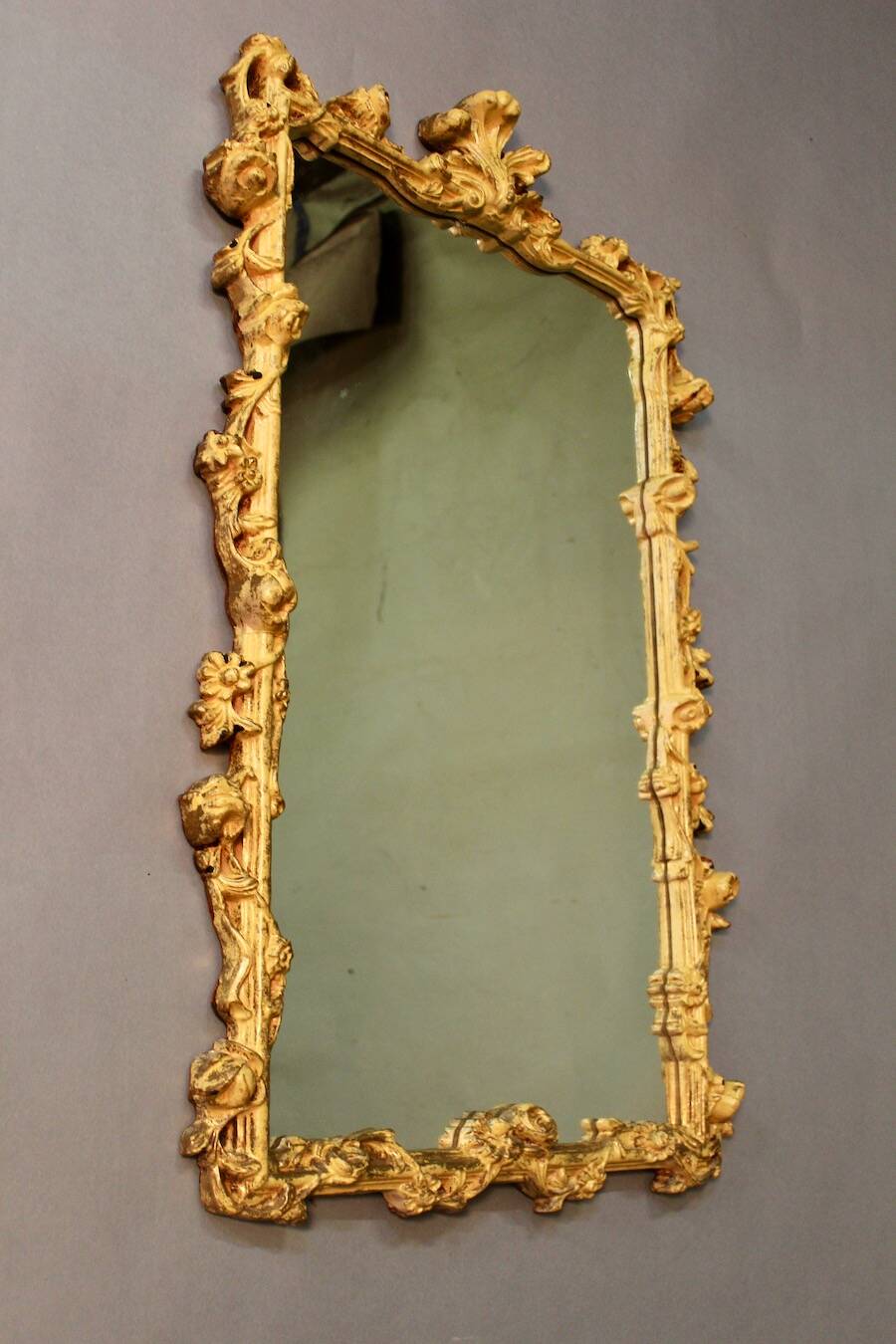 Marble top console and its rocaille style mirror