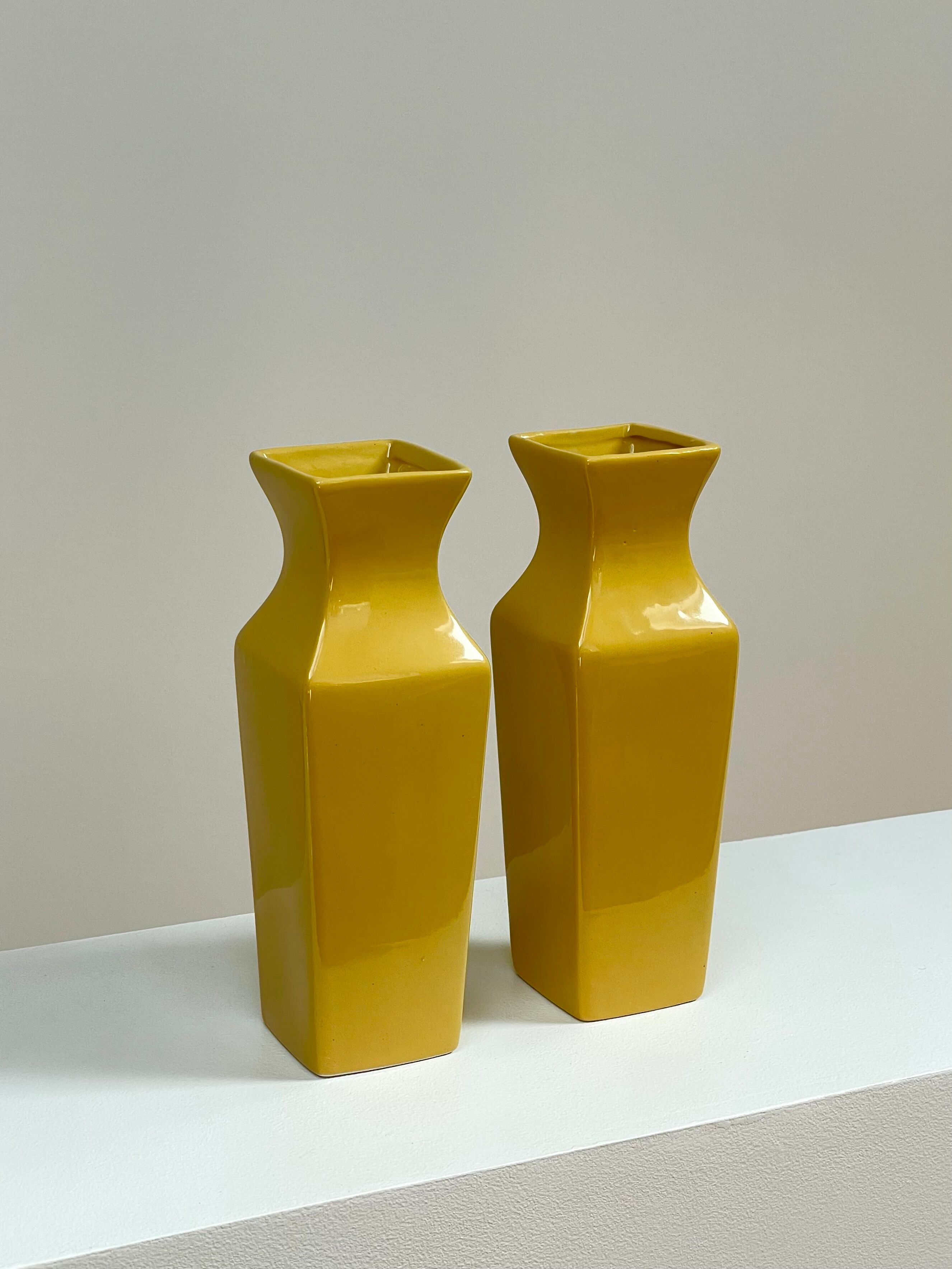 Duo of yellow vases