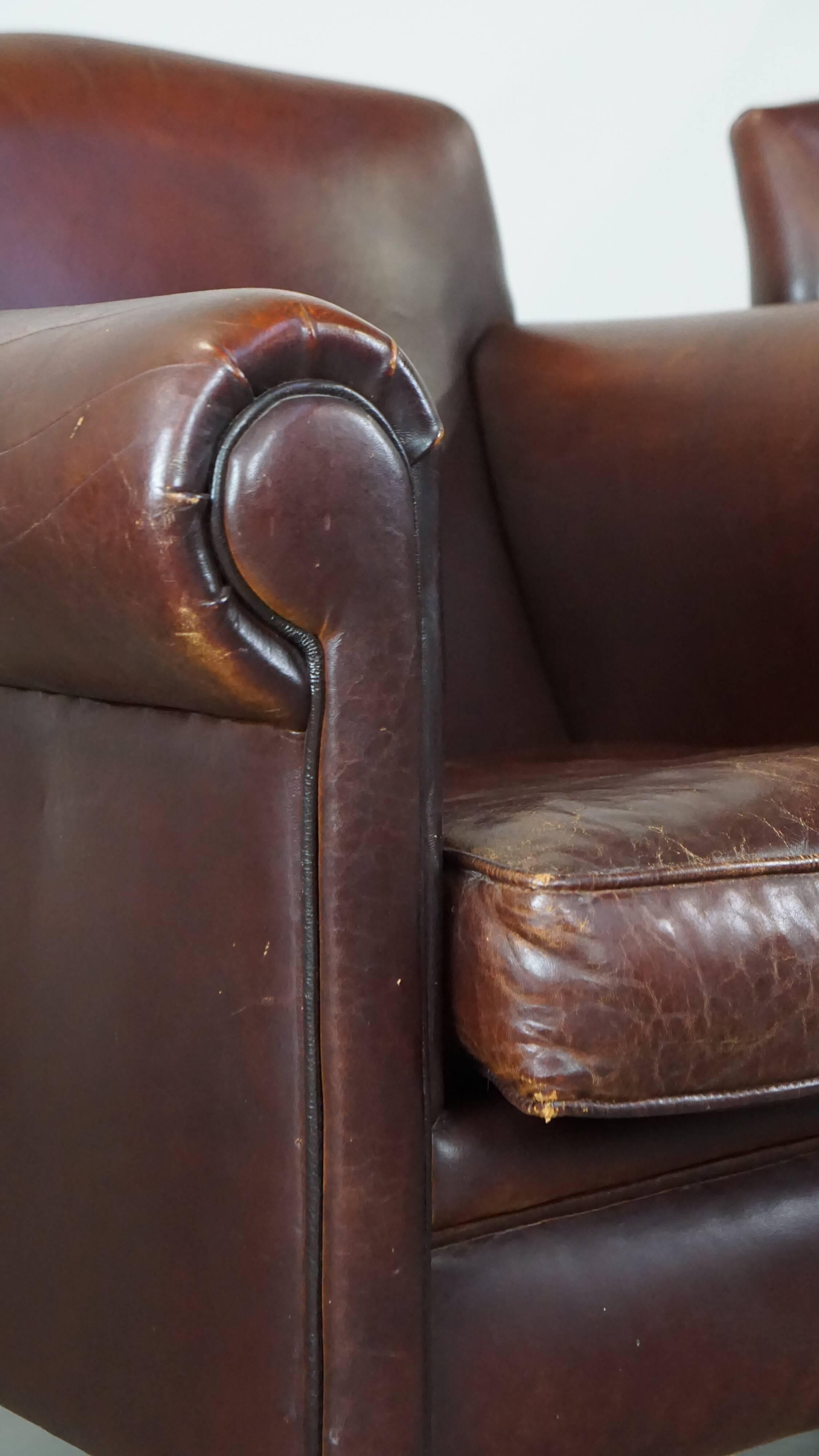 Set of 2 design armchairs made of sheepskin