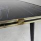 Vintage coffee table with glass top and angled legs