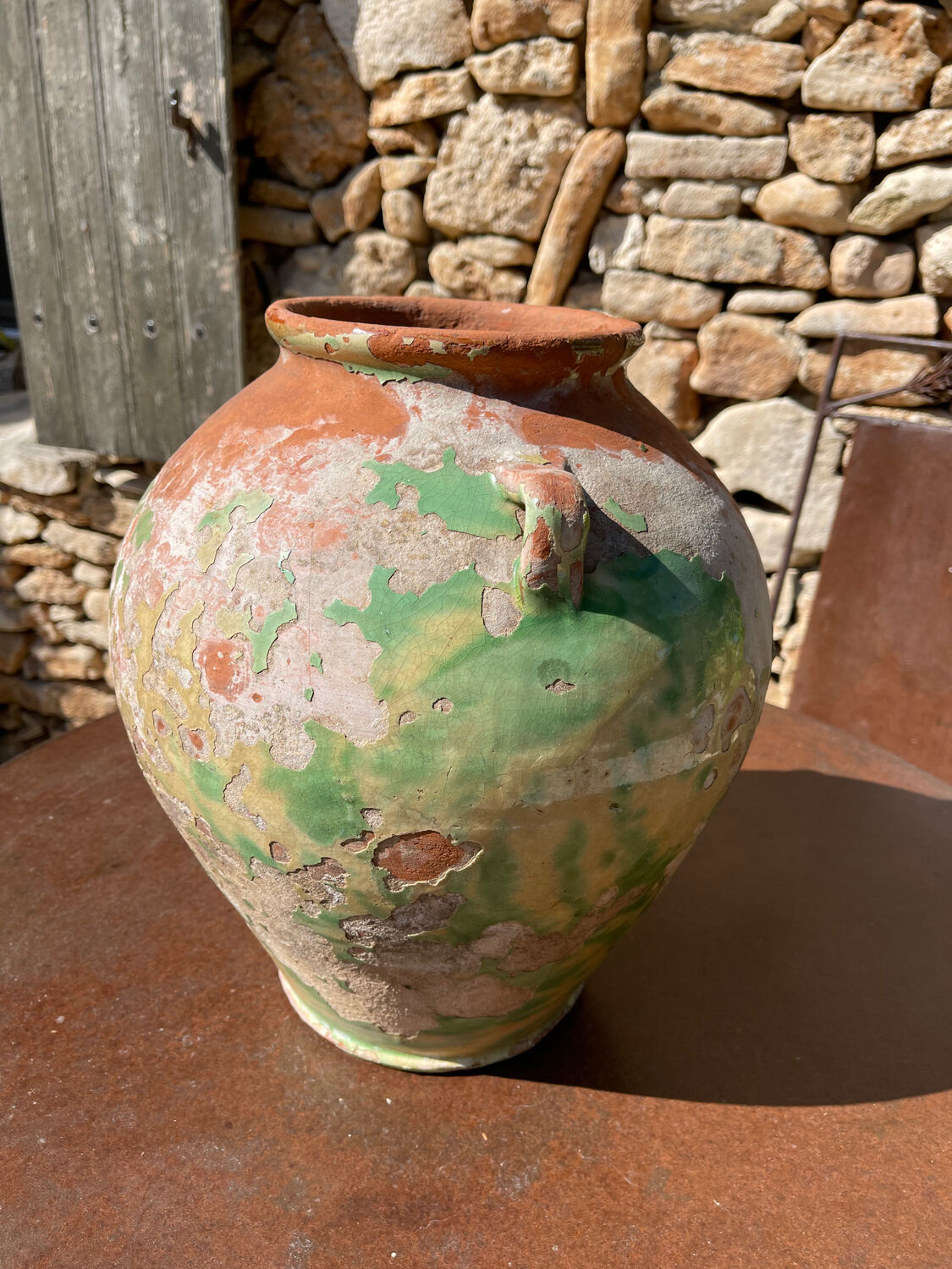 Ancient terracotta pottery jar from the 19th century.