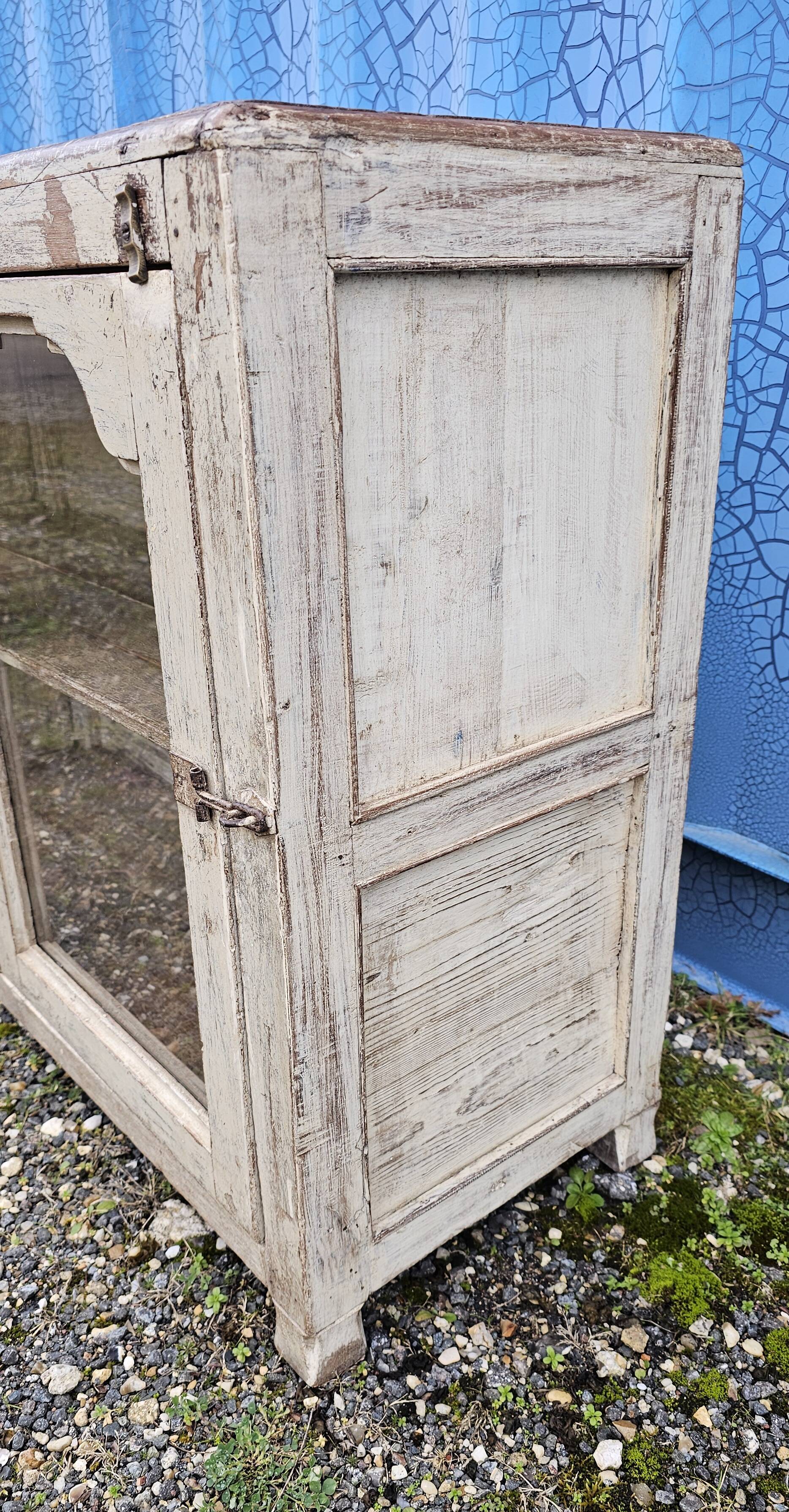 Vintage glass-fronted teak sideboard