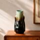 Rare ancient organic vase from Thulin in glazed flame pottery.