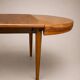 Vintage extendable round table, French made from the 1960s/70s.