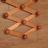 Accordion wall coat rack