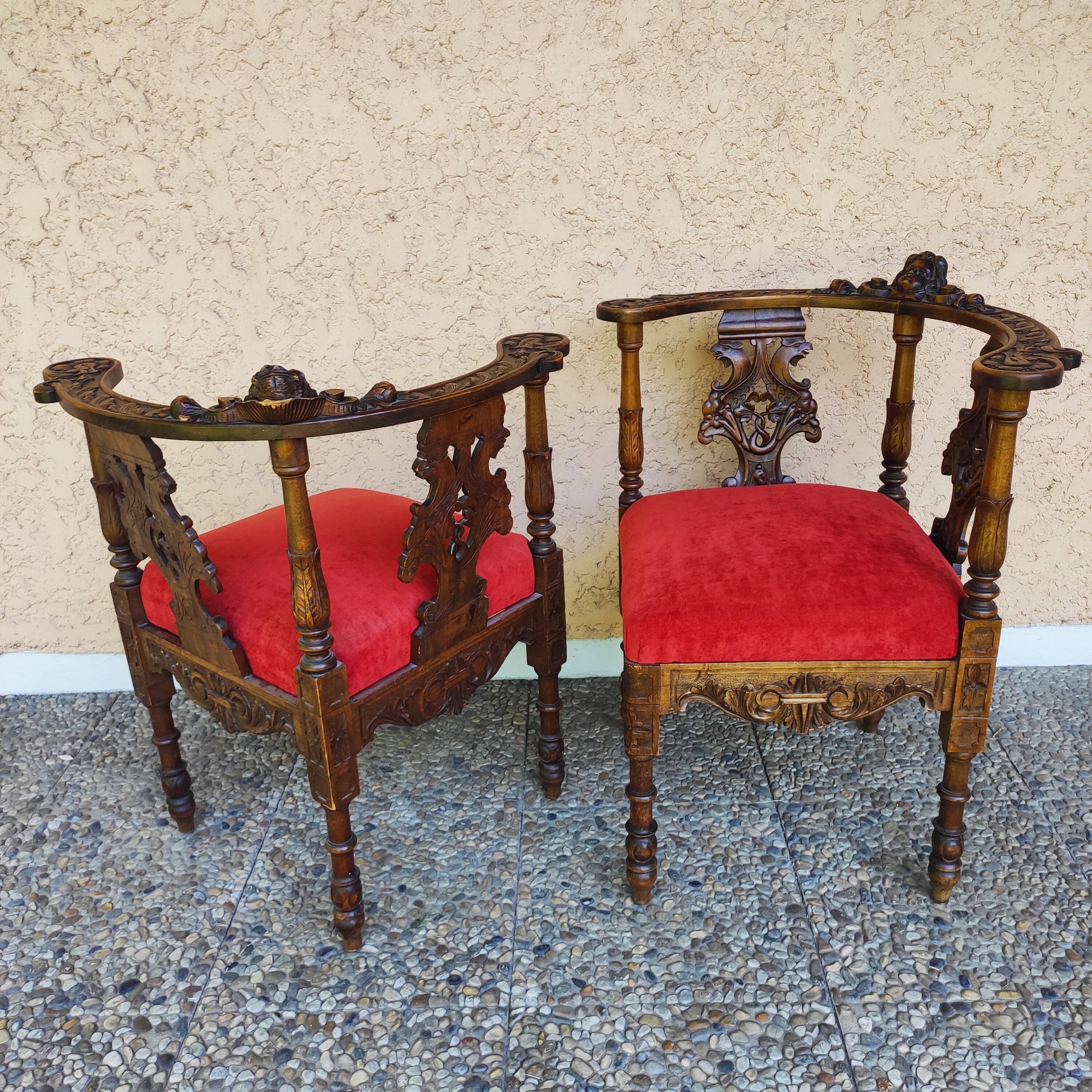 Pair of neo-Renaissance Henri II corner armchairs in carved wood, 19th century.