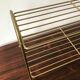 Gold metal shelf