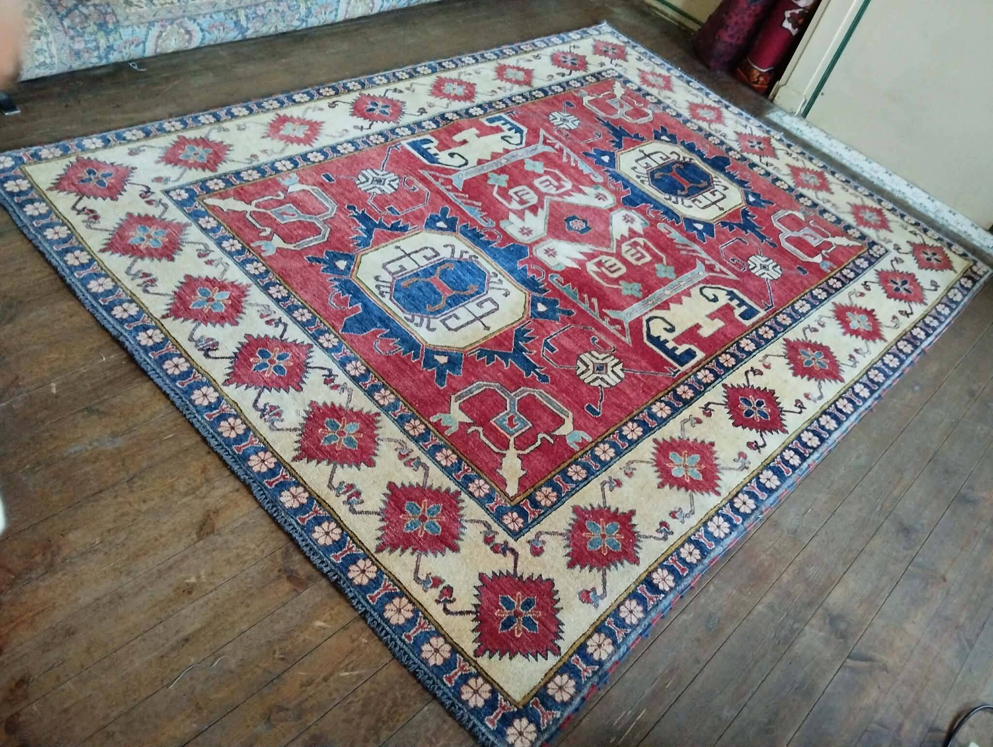 Handmade Pakistani Kazak rug 303x225cm