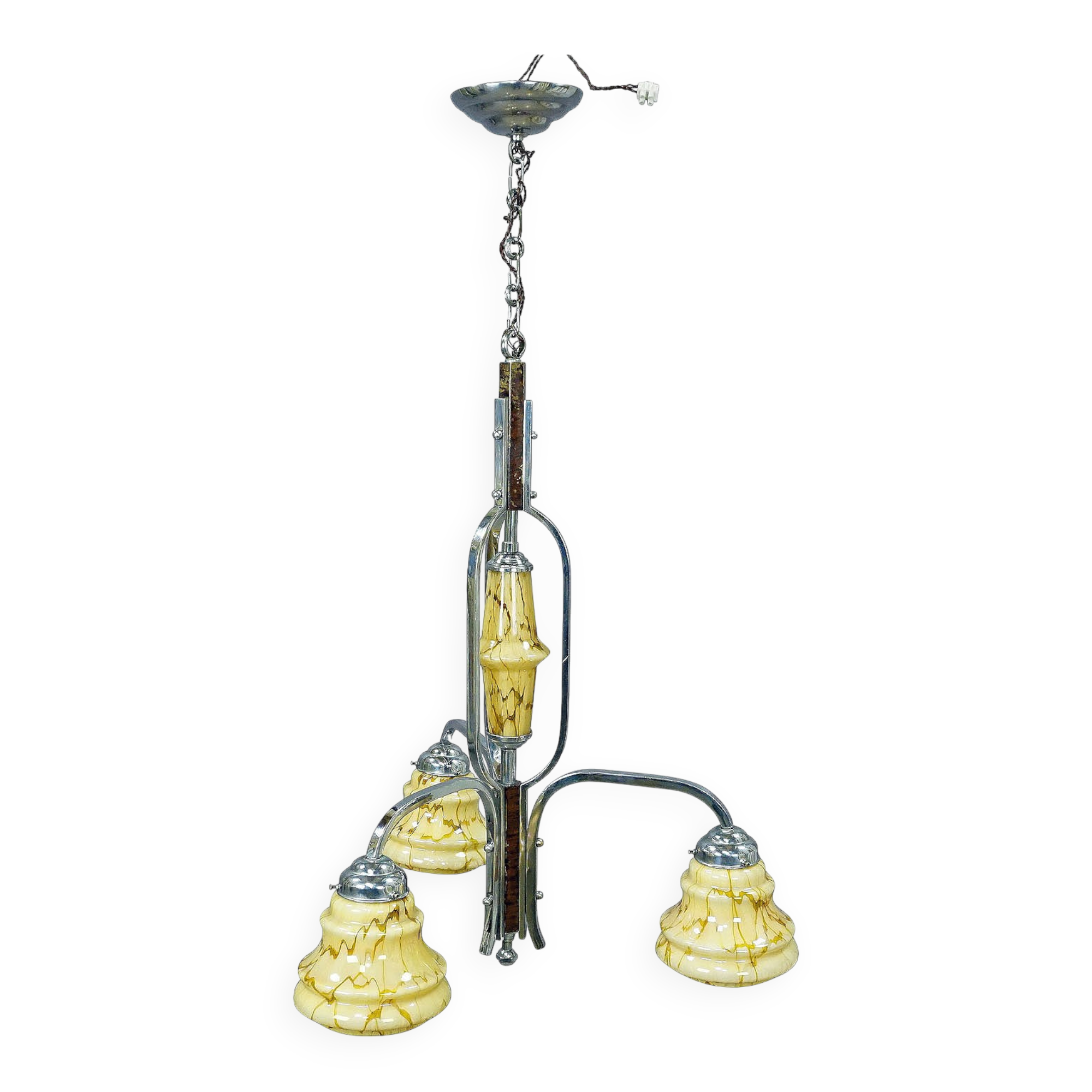 Antique Art Deco chandelier with three glass lampshades.