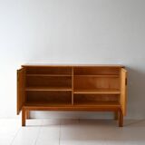 Scandinavian oak cabinet with woven rattan doors