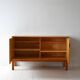Scandinavian oak cabinet with woven rattan doors