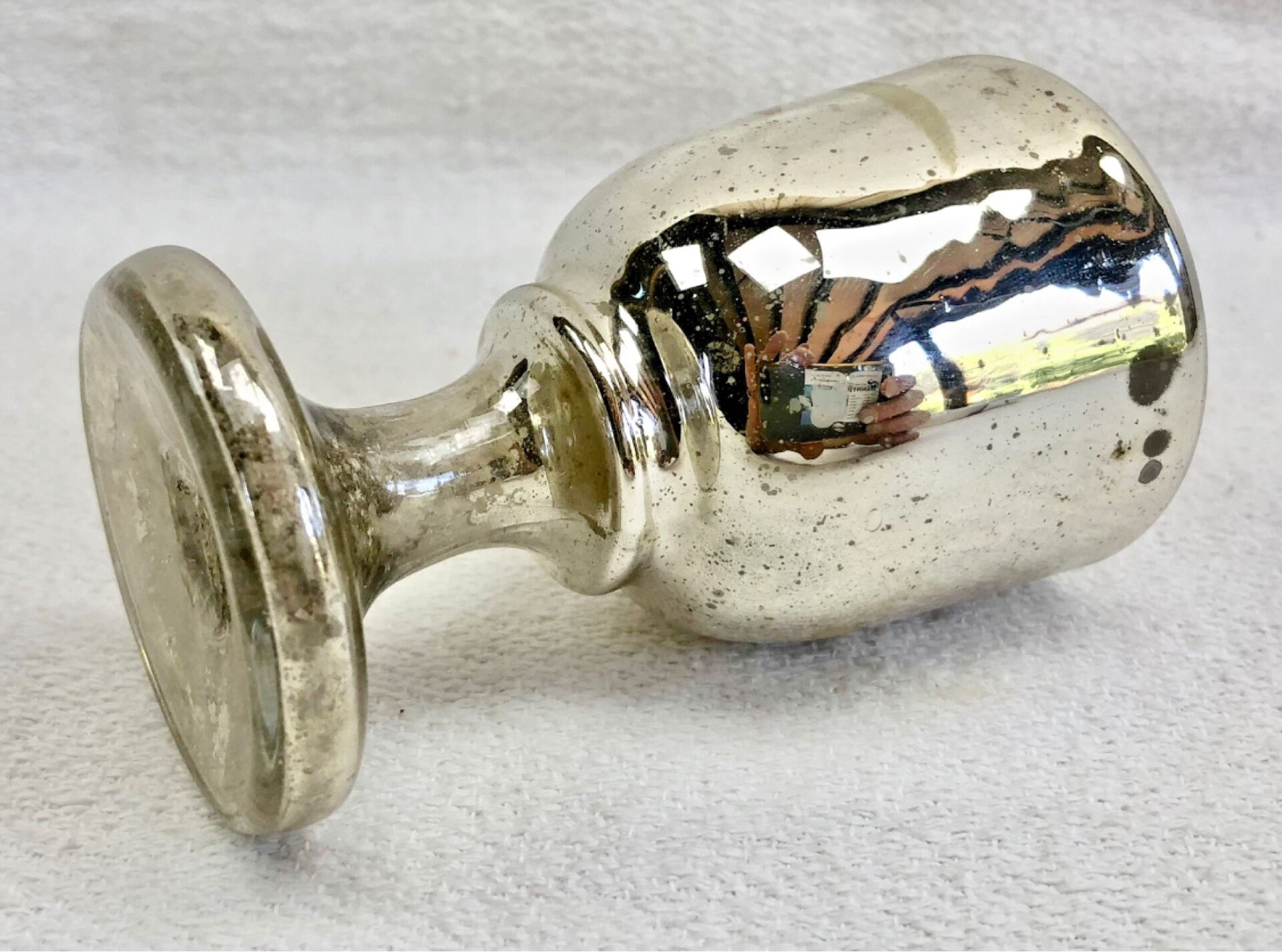 Painted blown glass egg cup with mercury gilding, 19th century.