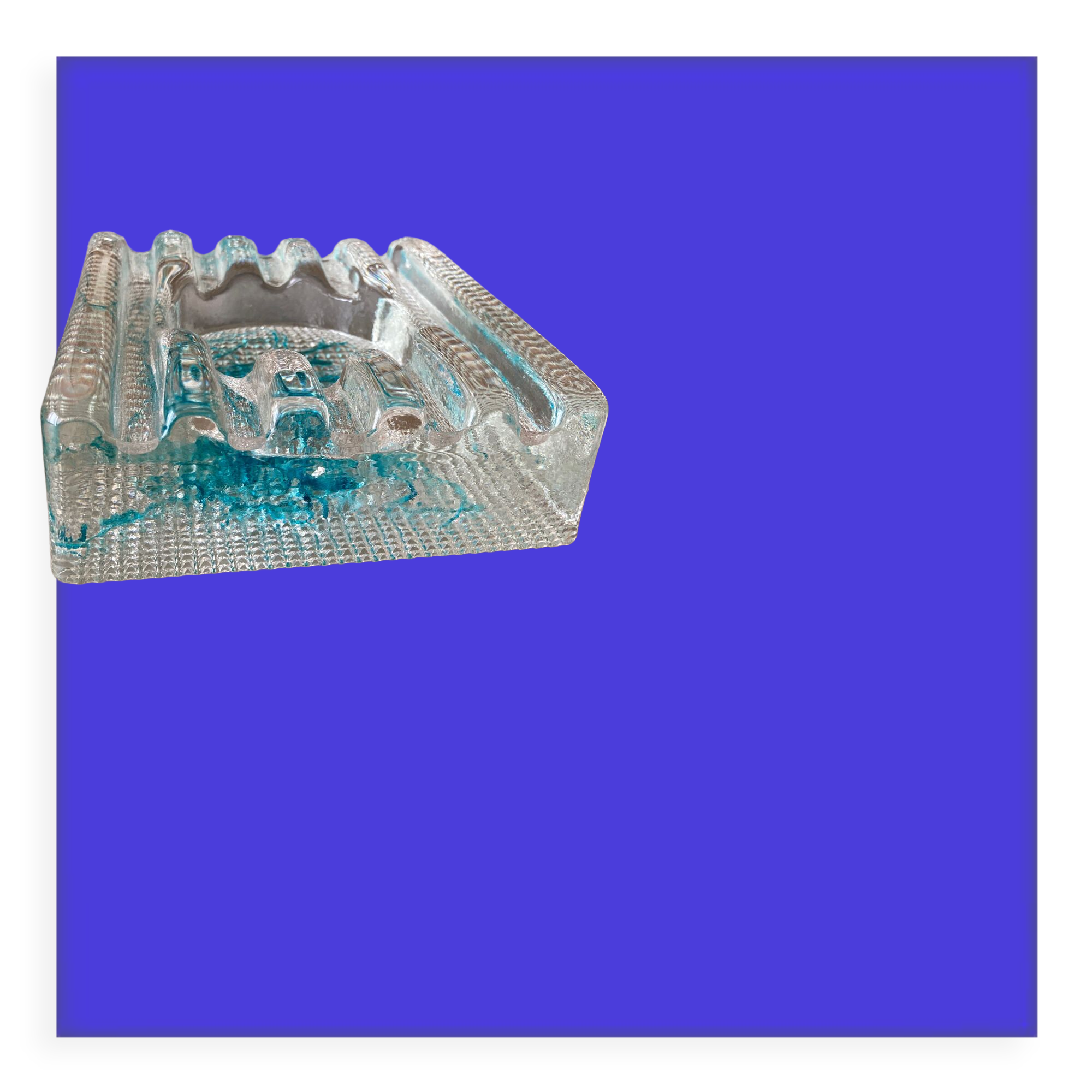 Empty pocket or large glass ashtray