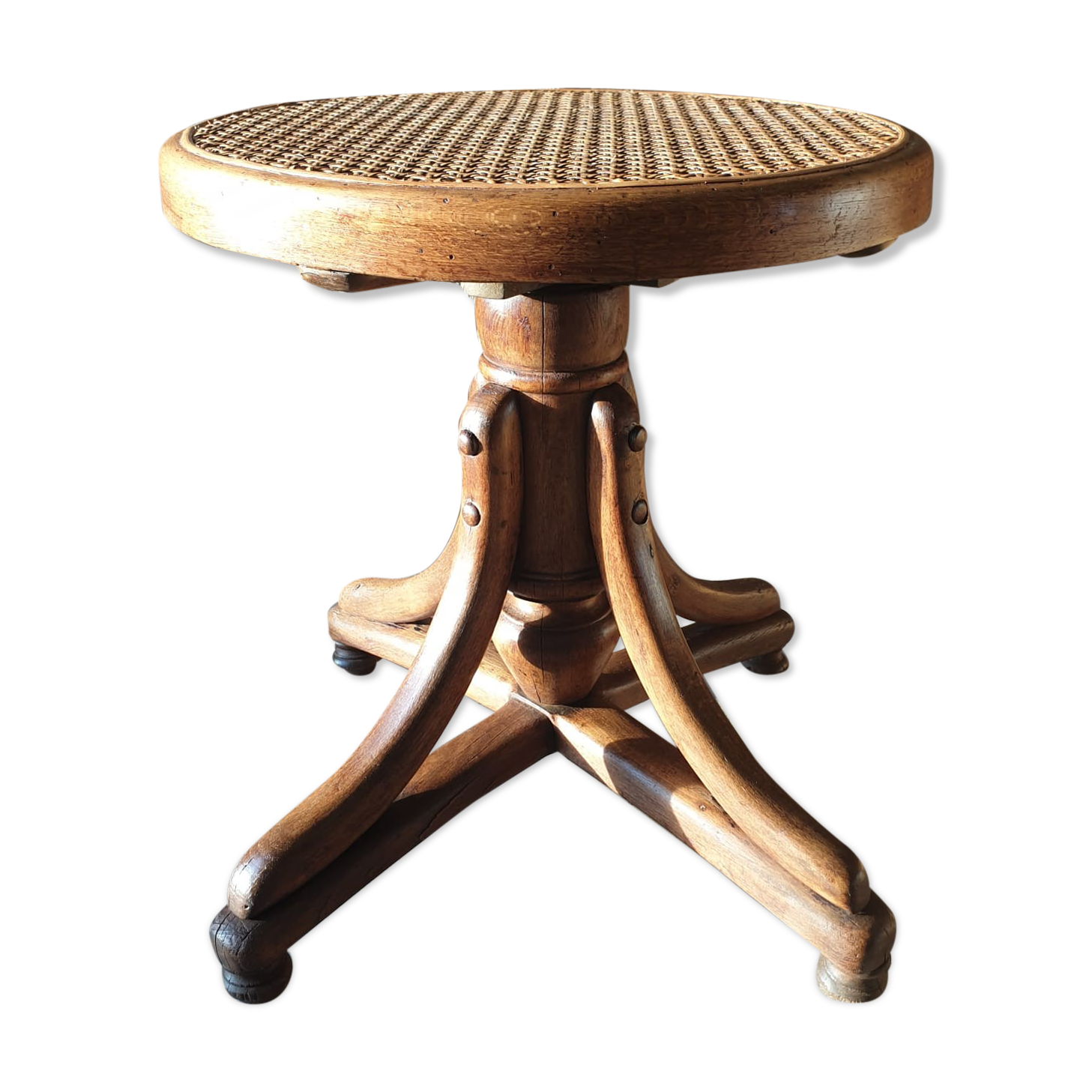 Curved wooden piano stool
