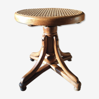 Curved wooden piano stool
