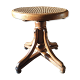 Curved wooden piano stool