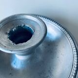 Old aluminum candle holder