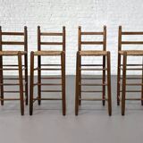 Set of 4 50s bar stools in wood and woven straw seat
