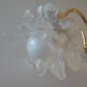 Vintage chandelier with roses in glass paste