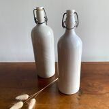 Set of 2 old bottles in glazed stoneware