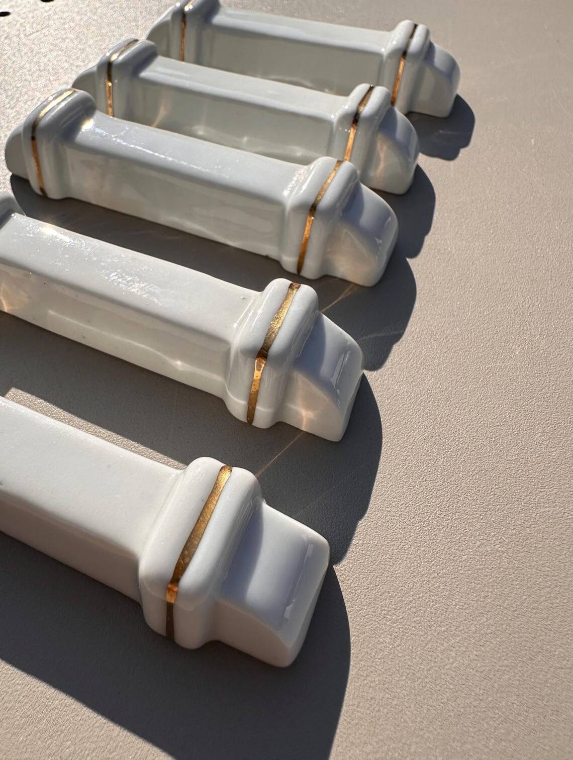 Vintage Knife Rest in White Porcelain with Gold Trim