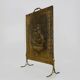 Fireplace screen in repoussé brass with a sailing boat. 1960s.